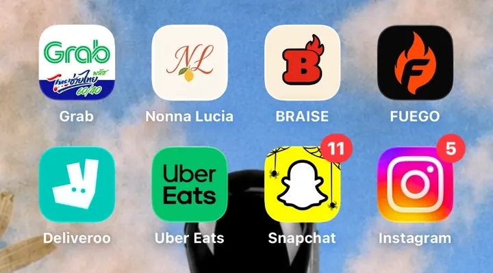Les icônes Nonna Lucia, Braise et Fuego à côté de Grab, Deliveroo et Uber Eats sur un écran d'accueil